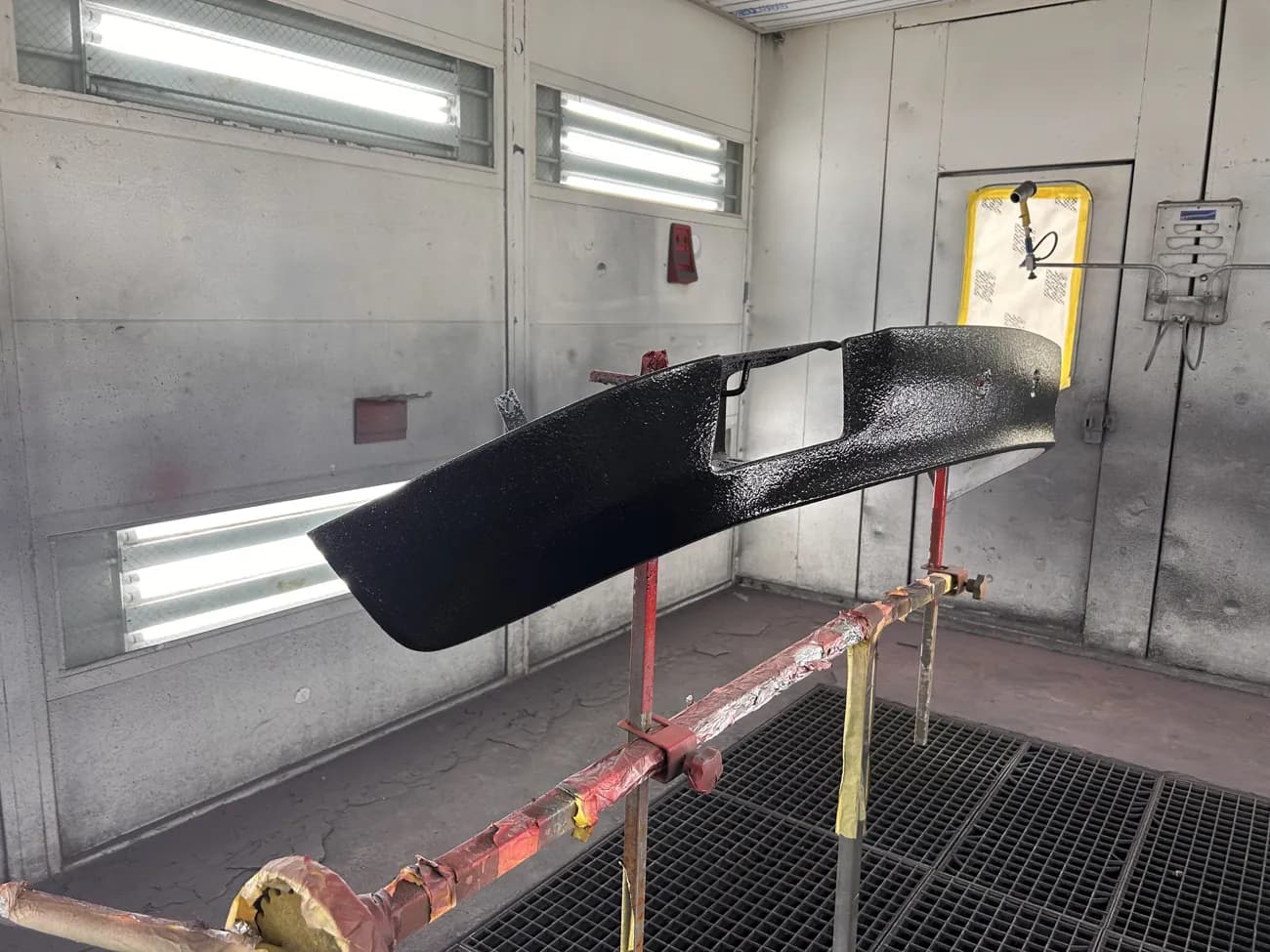 Bumper on a stand, refinished.