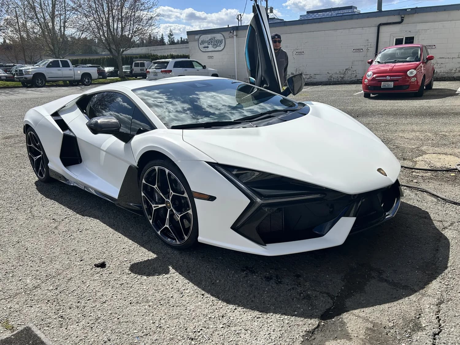 White Lamborghini Revuelto, door detail.
